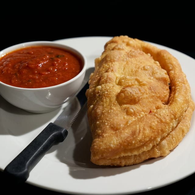 Fried Veggie Calzone (spinach & mushroom).